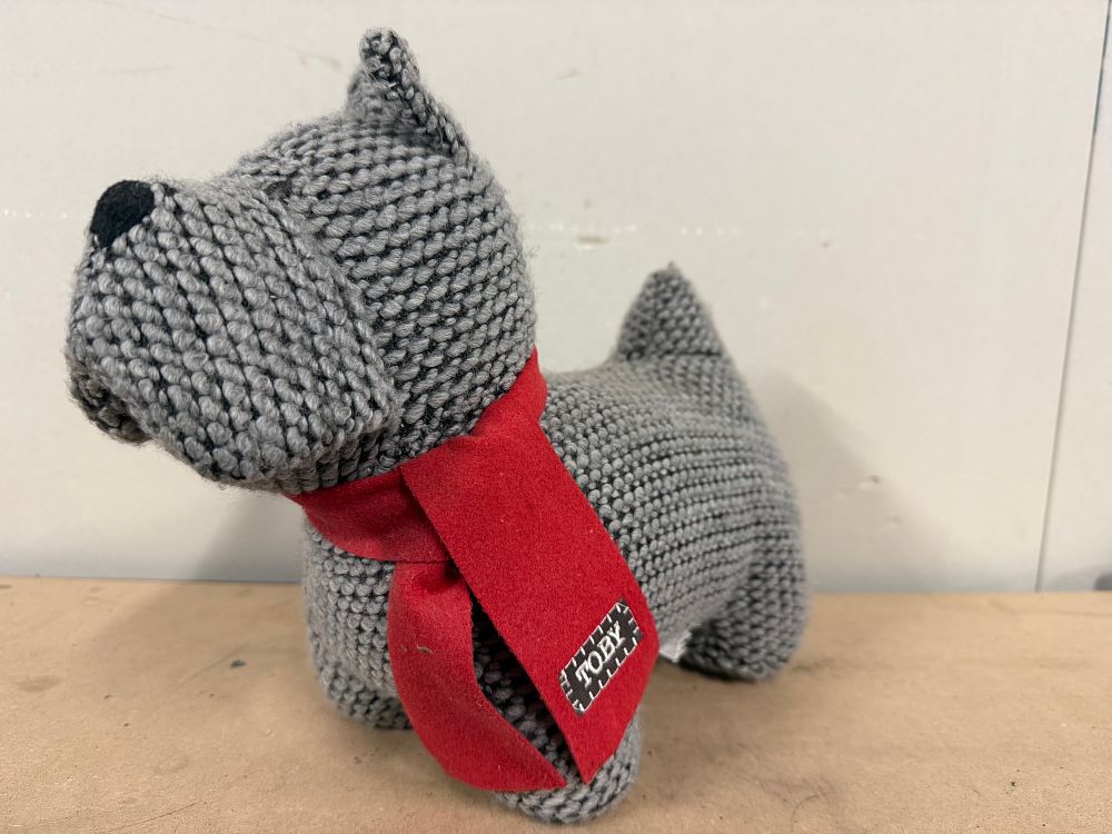 Lot 59: A Toby grey knitted Scottish Terrier stuffed door stop