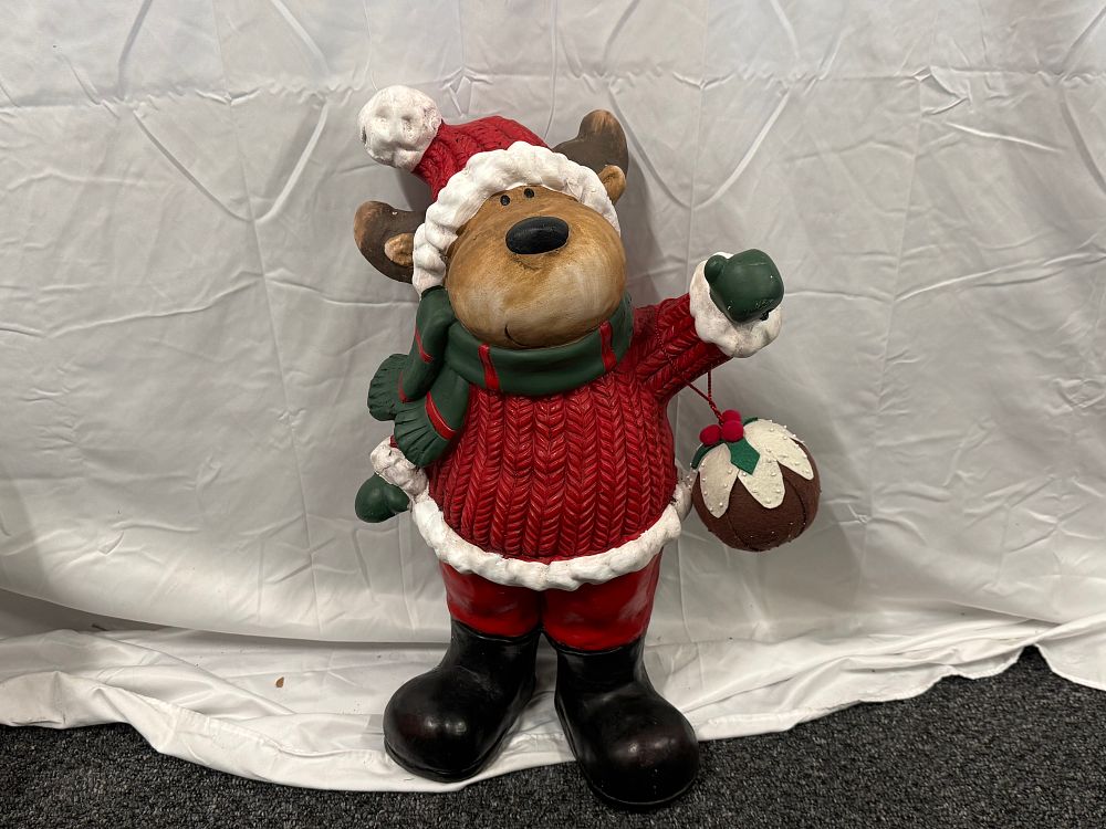 Lot 71: A large painted polyresin Christmas reindeer decorative figurine