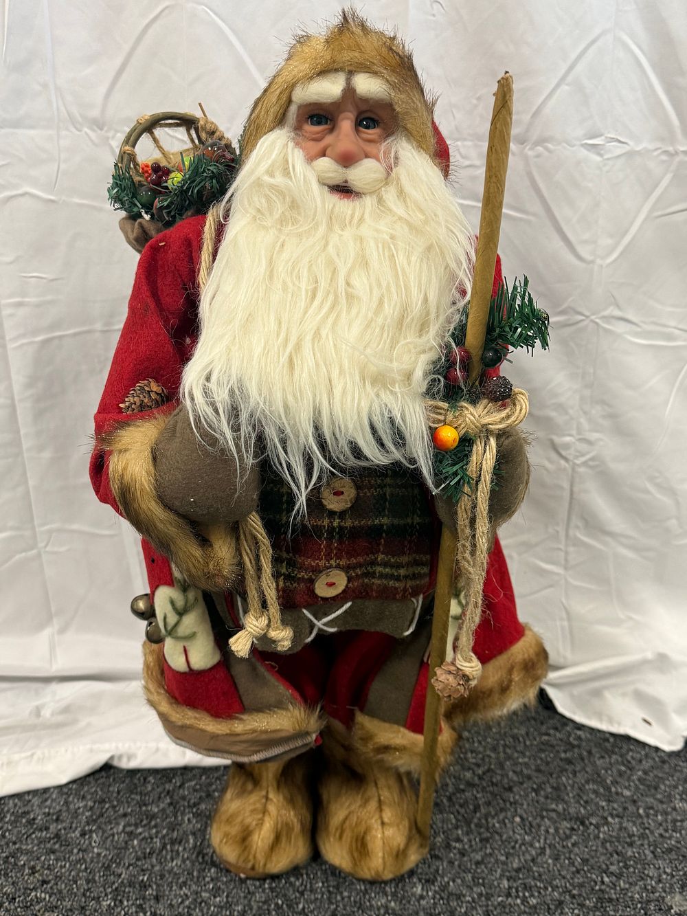 Lot 72: A rustic wilderness style standing Santa Claus figurine
