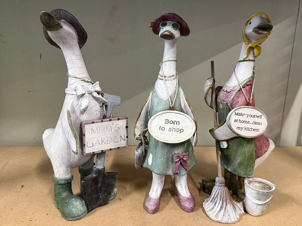 Lot 73: A trio of decorative resin novelty goose figurines