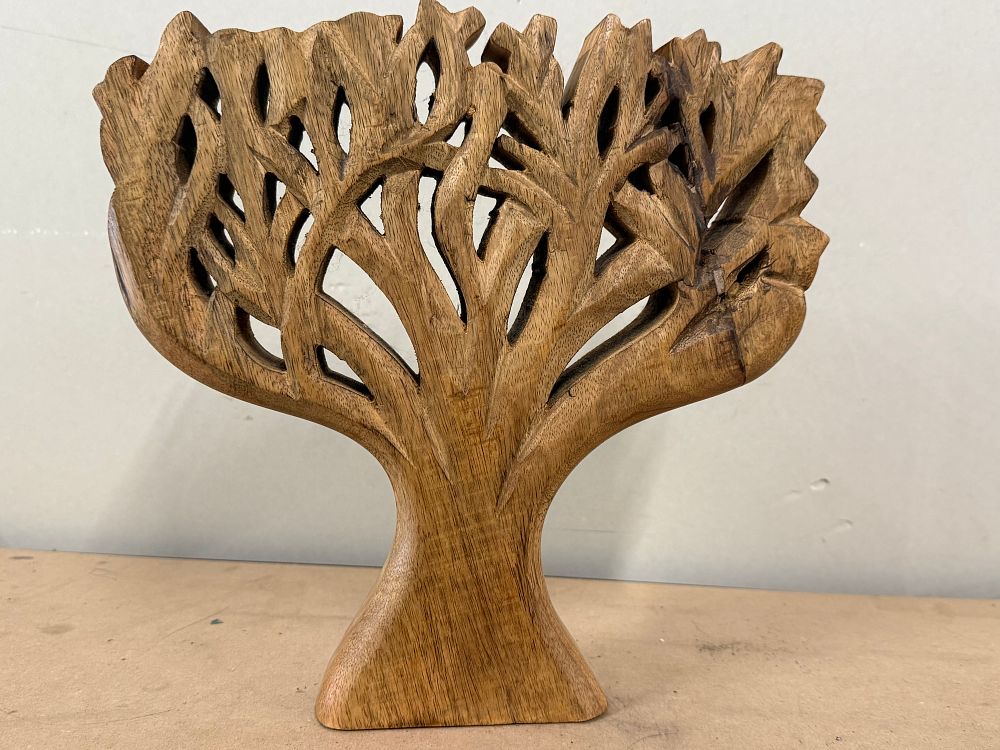 Lot 74: A hand-carved tropical hardwood Tree of Life sculpture