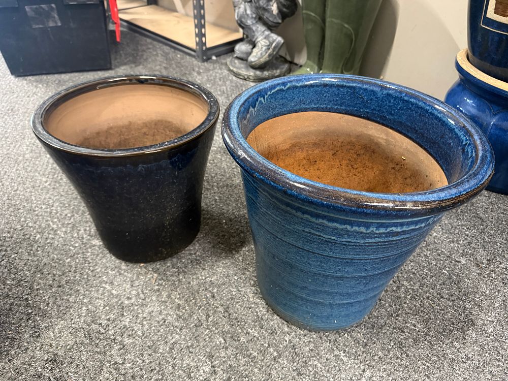 Lot 77: A pair of glazed stoneware garden planters in blue