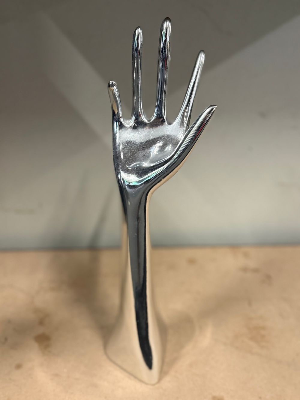Lot 93: A polished chrome decorative hand jewellery display stand