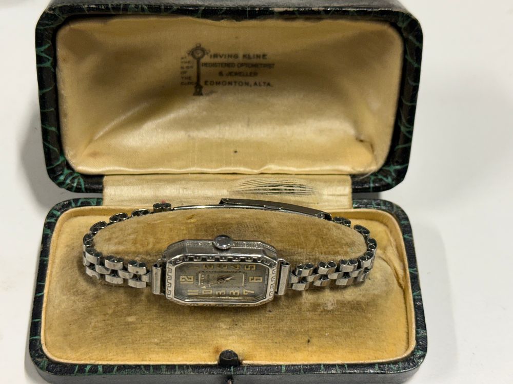 Lot 119: An Art Deco white metal cocktail watch by Valdon