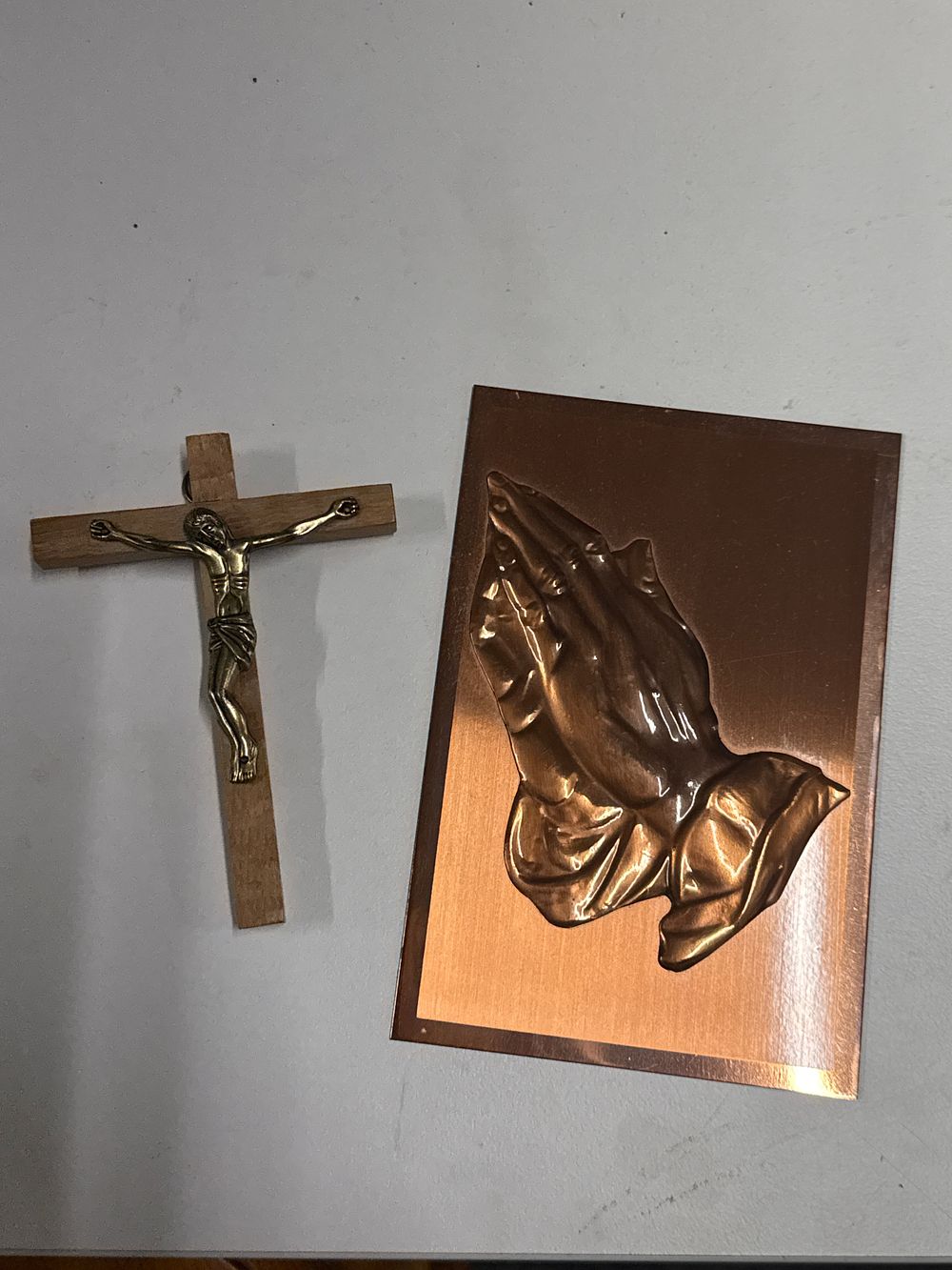 Lot 123: Two religious devotional items including a copper repoussé plaque