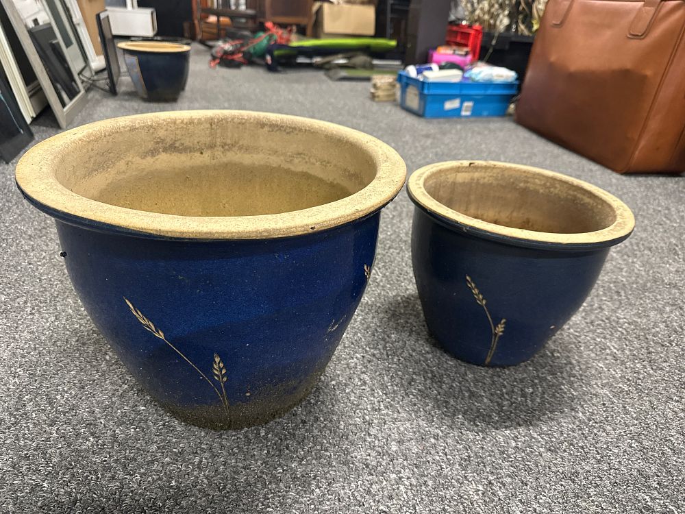 Lot 131: A duo of graduated cobalt blue glazed ceramic garden planters