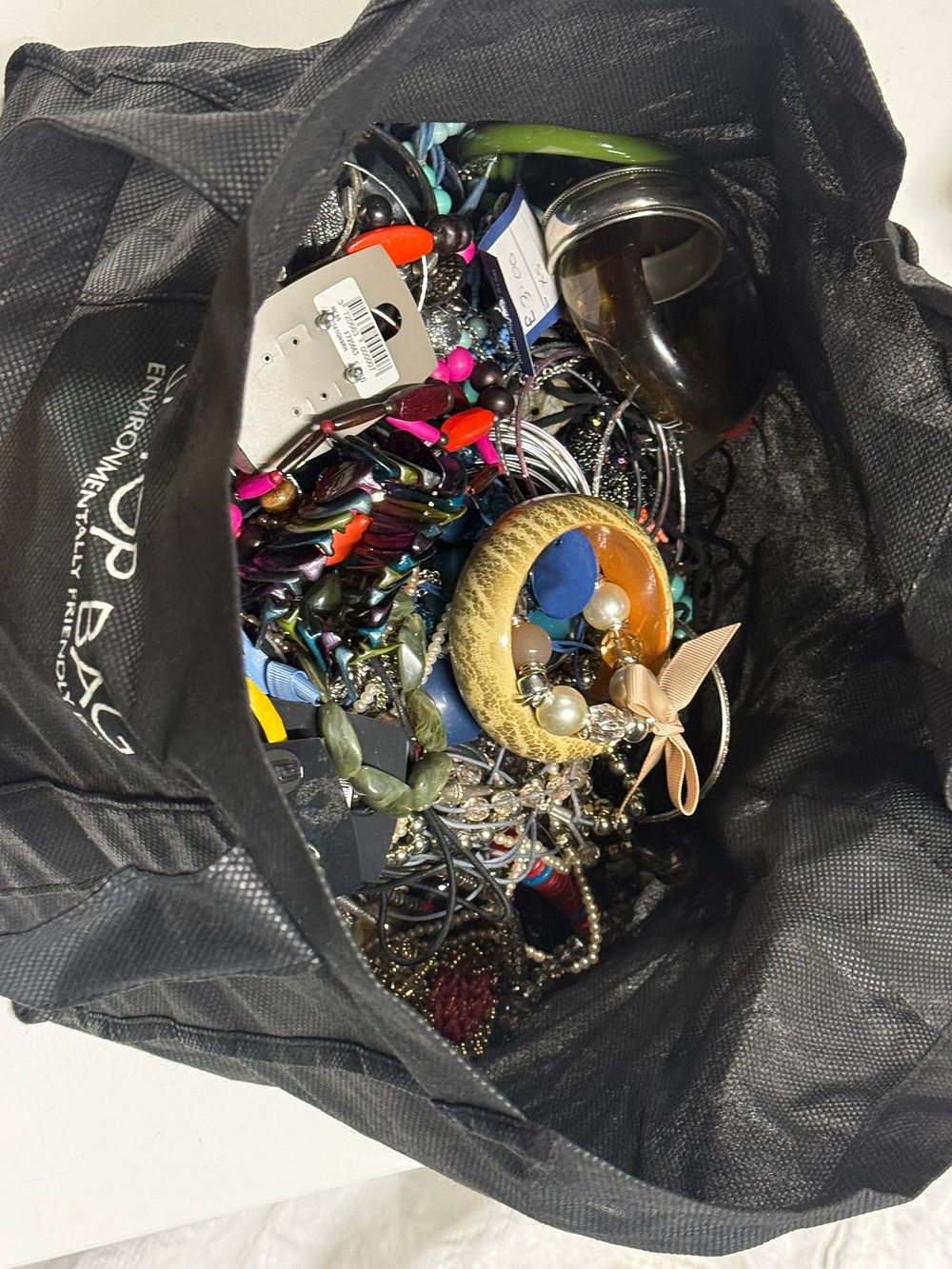 Lot 136: A collection of assorted costume jewellery including bangles and necklaces