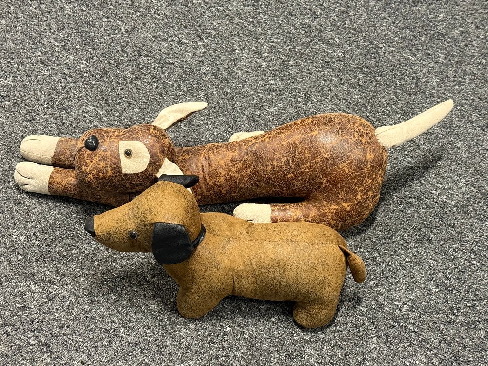 Lot 139: A Pair of dog Faux Leather Decorative Doorstops
