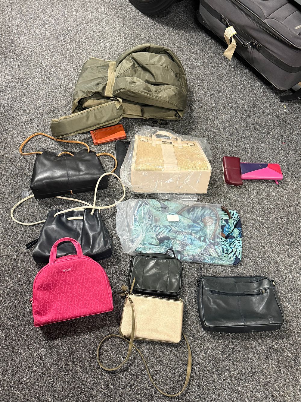 Lot 169: An assortment of contemporary travel bags, handbags and leather wallets