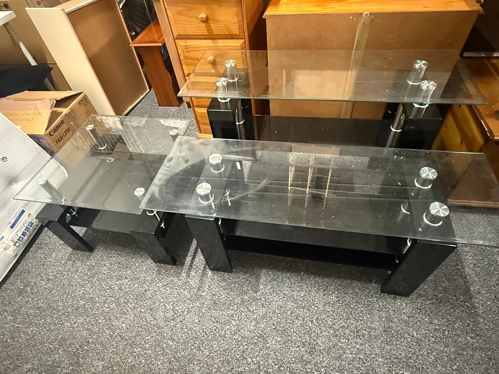 Lot 181: A set of 3 of modern multi-tiered glass and metal tables