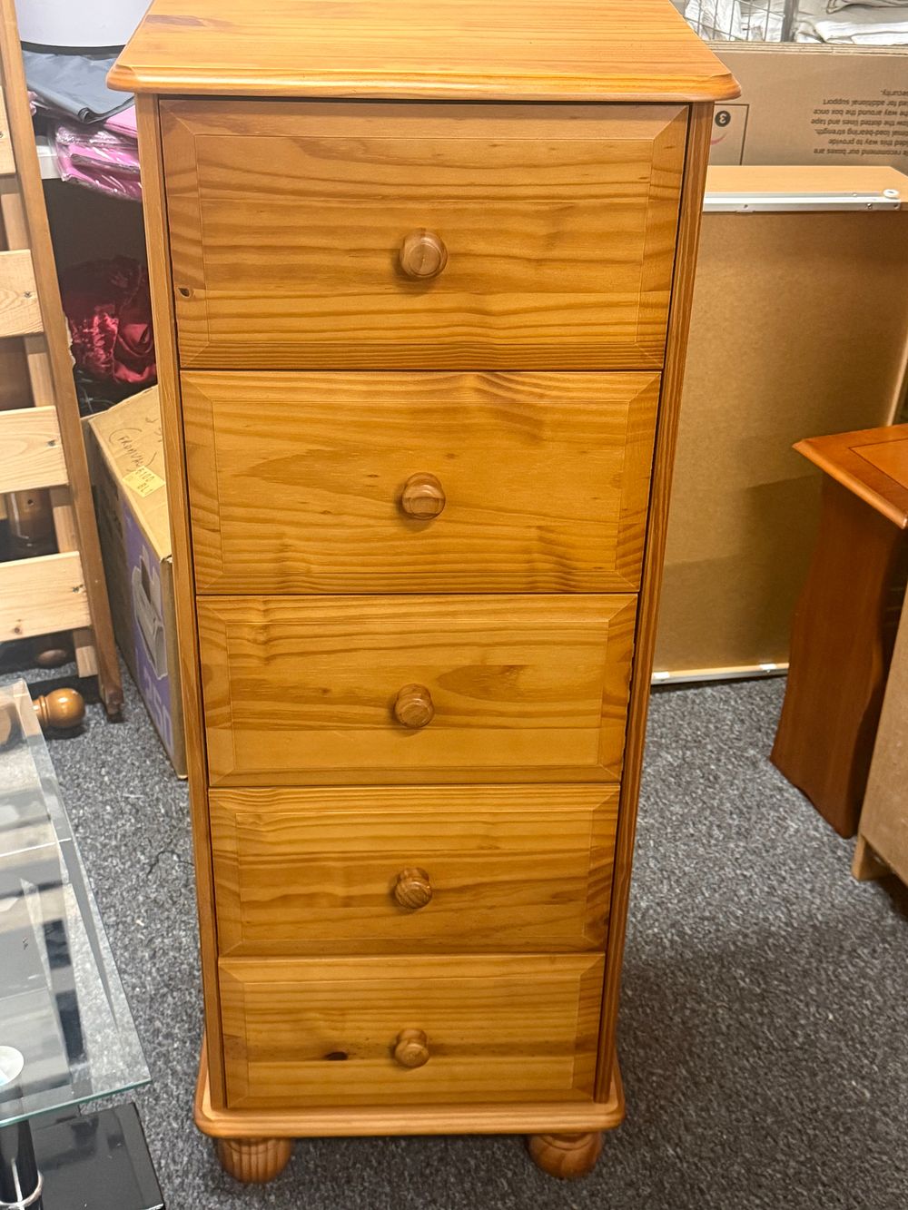 Lot 182: A contemporary narrow pine five drawer Wellington chest