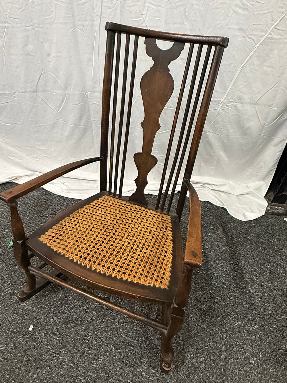 Lot 186: Victorian Style Stained Hardwood Rocking Chair with Cane Seat