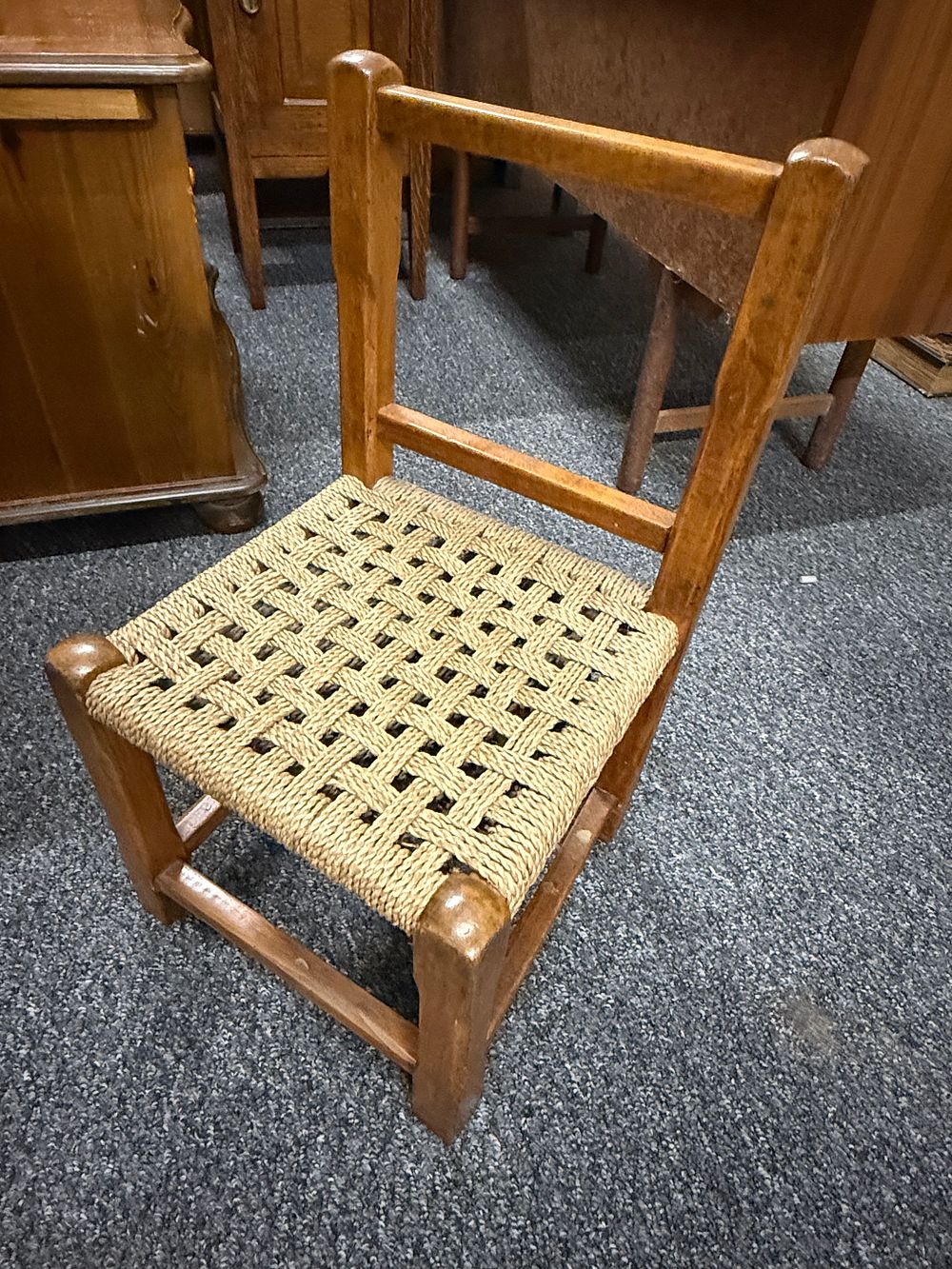 Lot 187: An oak side chair with woven rope seat