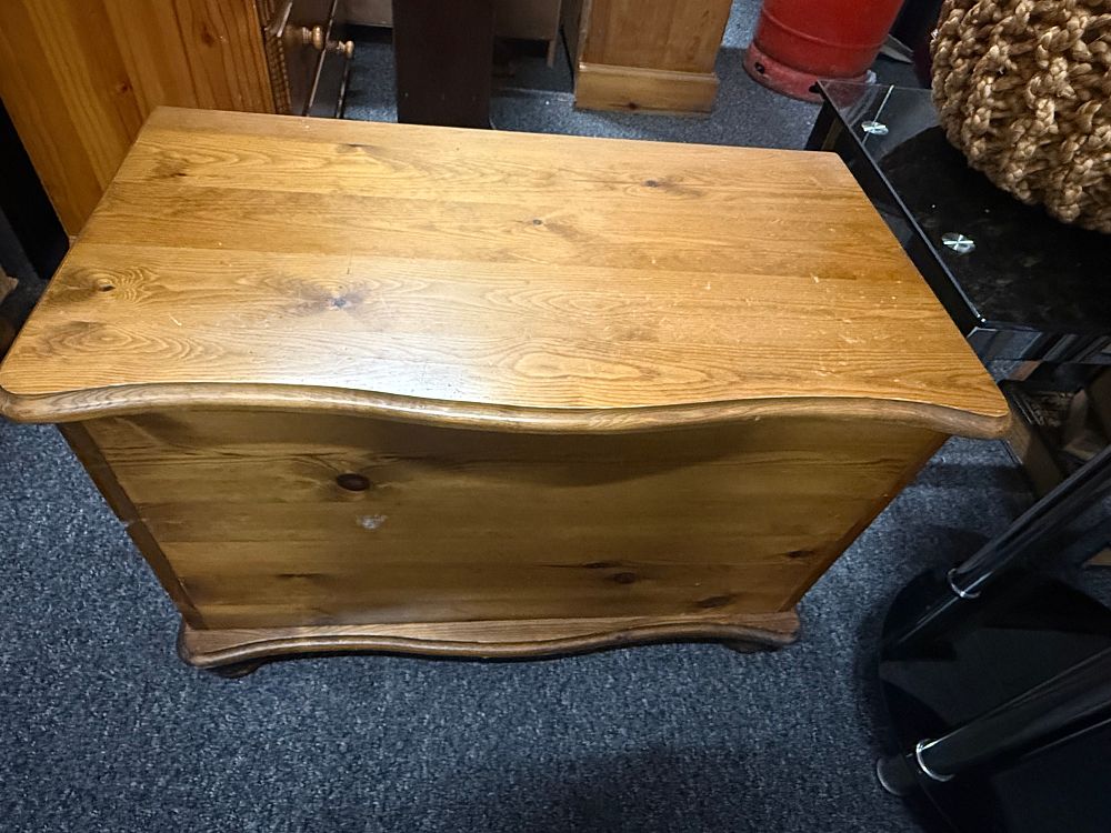 Lot 188: A modern pine blanket chest with serpentine front