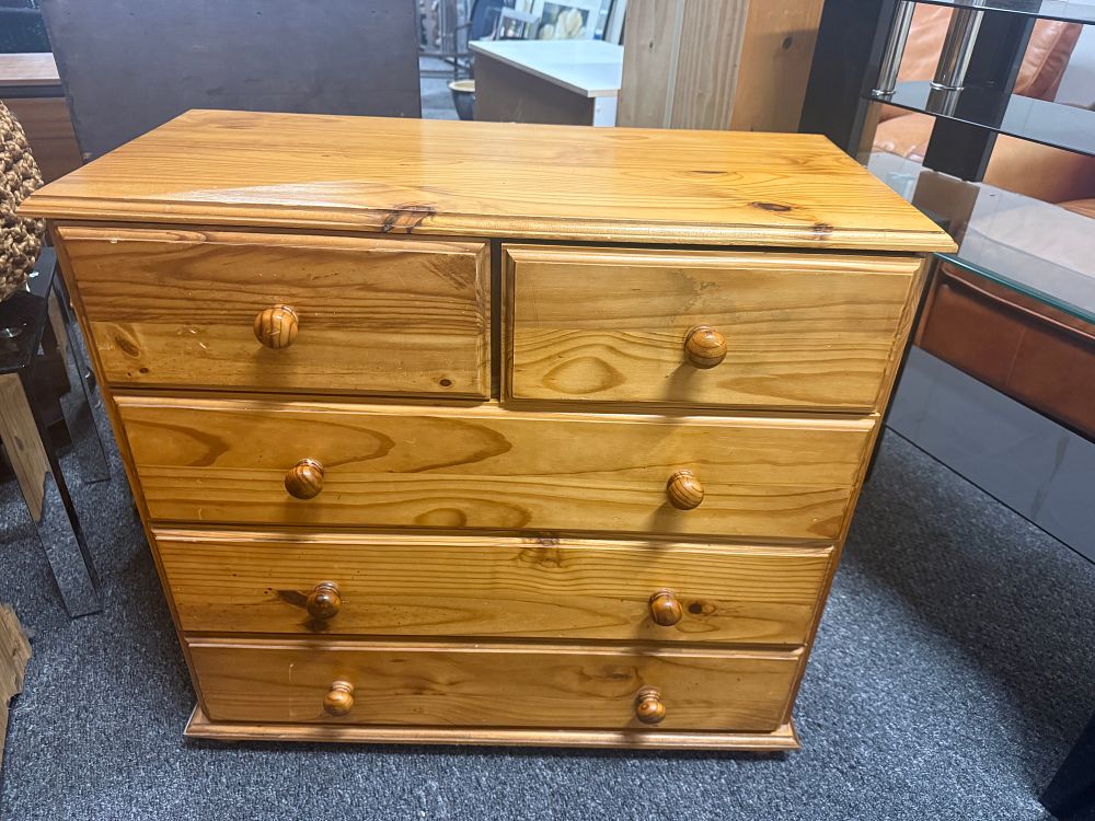 Lot 191: A contemporary solid pine two over three chest of drawers