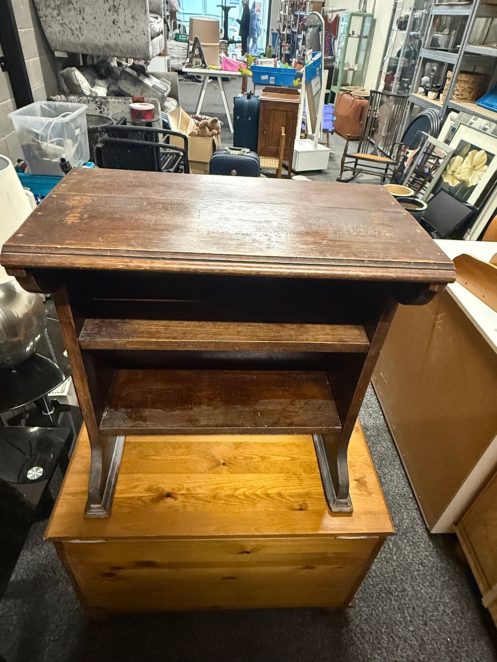 Lot 192: A vintage dark stained wood church prayer stand