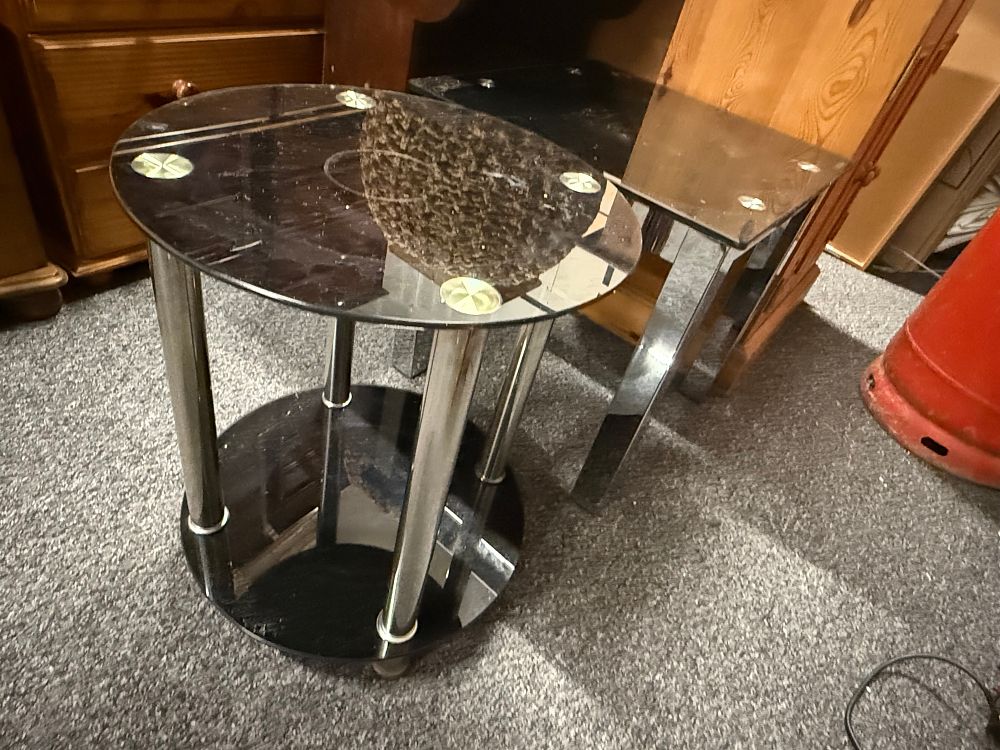 Lot 197: Two modern black glass and chrome-finished occasional tables