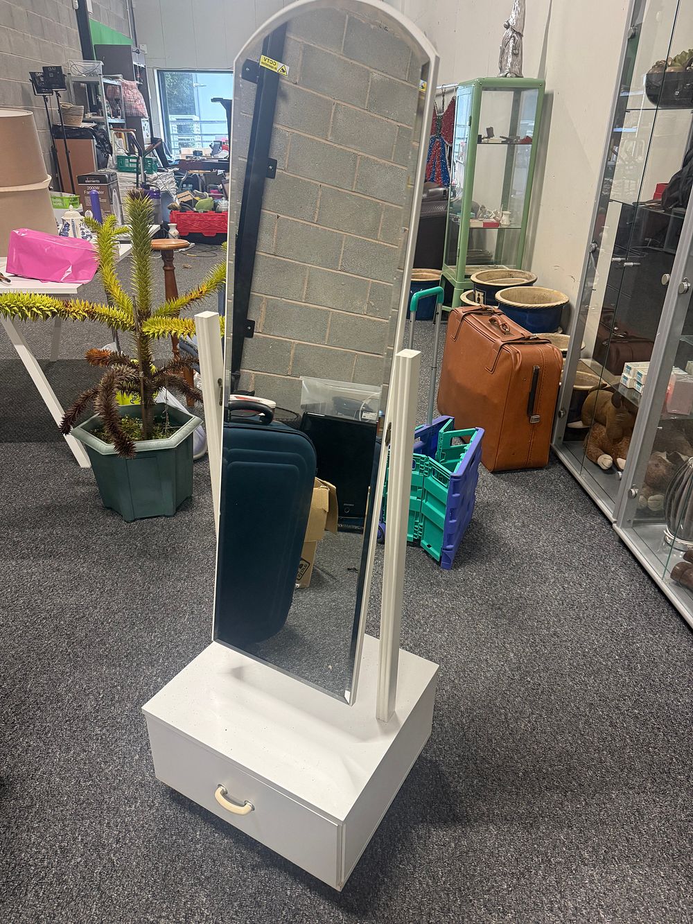 Lot 202: A contemporary white laminate cheval mirror with integral drawer base