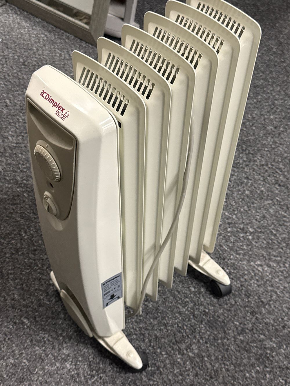 Lot 207: A Dimplex eco white multi finned oil free column heater