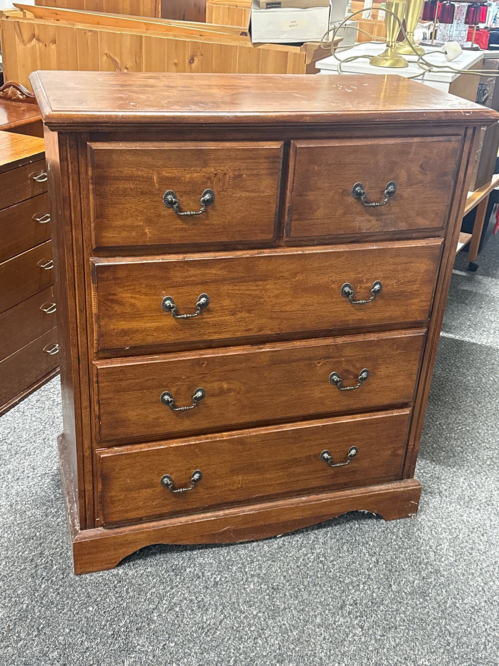 Lot 216: A traditional mahogany five drawer chest of drawers
