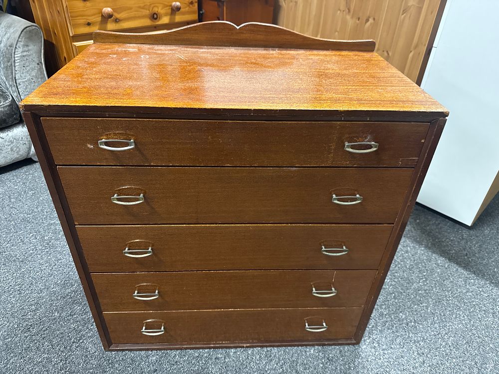 Lot 220: Mid-century mahogany veneered five drawer chest of drawers
