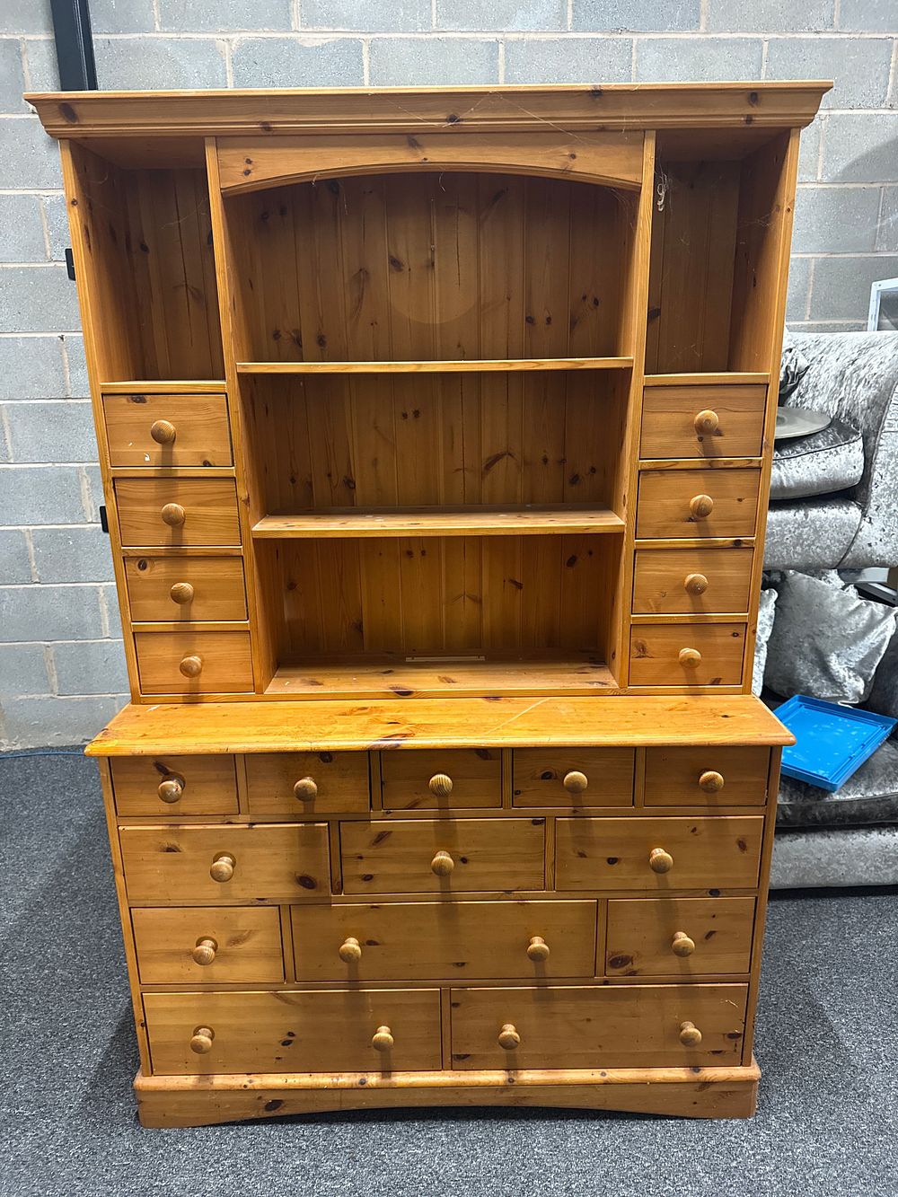 Lot 225: A large pine apothecary style hutch and chest of drawers