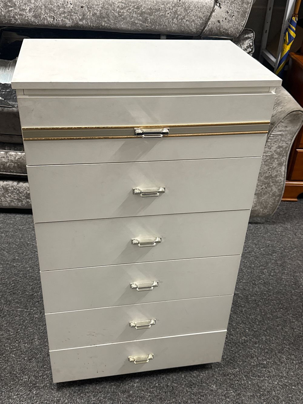 Lot 224: A white laminate chest of six drawers