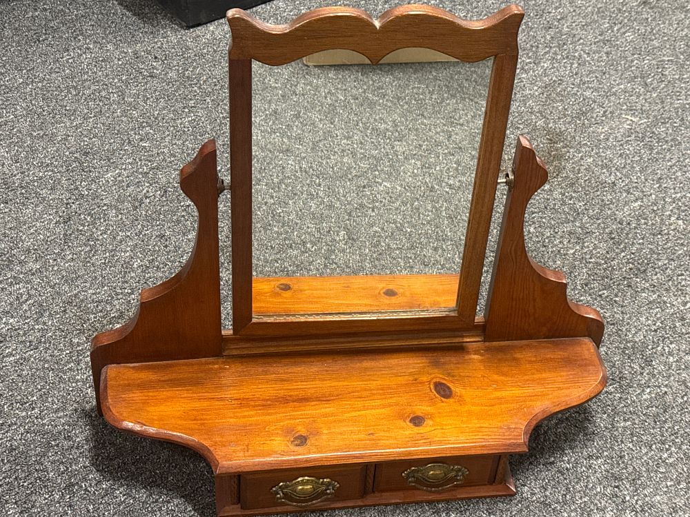 Lot 236: A vintage pine vanity swing mirror with base drawers