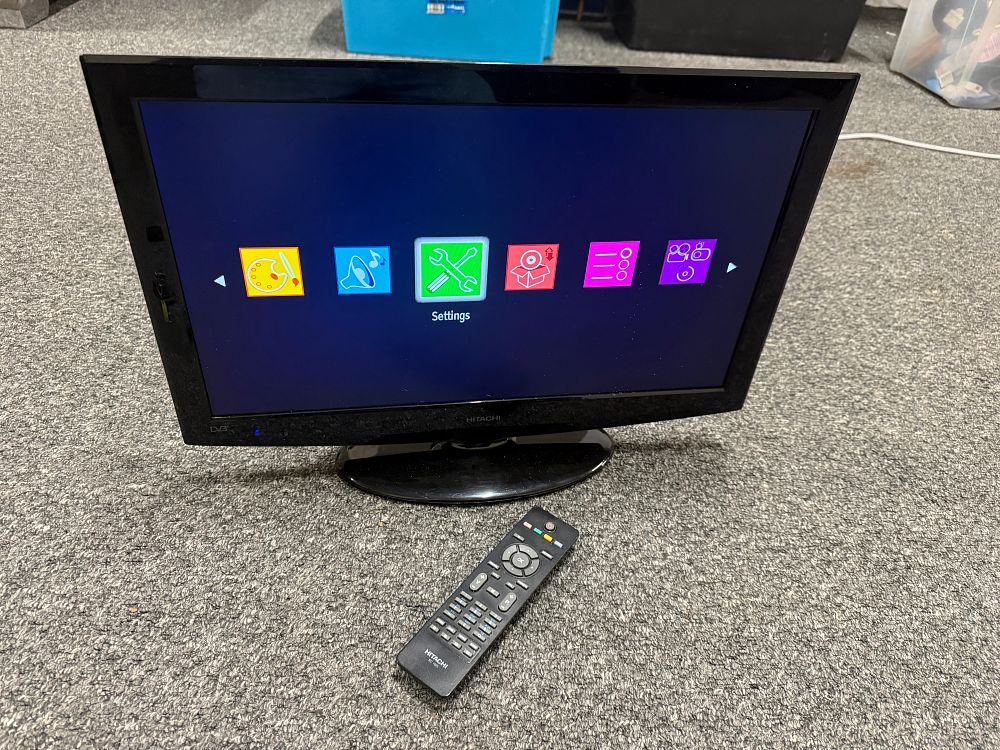 Lot 239: A Hitachi twenty-two inch LCD HD-Ready television and remote