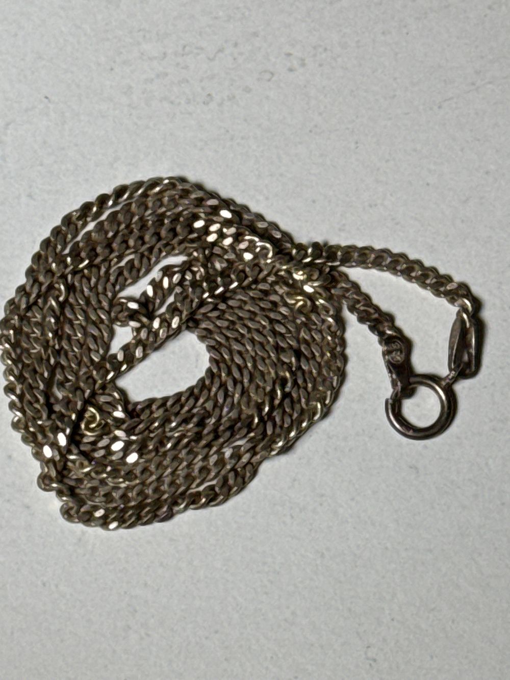 Lot 125a: A Sterling Silver Curb Link Chain Necklace