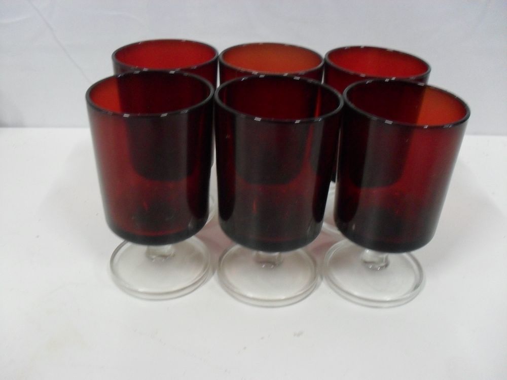Lot 250: Set of 6 Cranberry ( red glass) clear stemmed Glasses