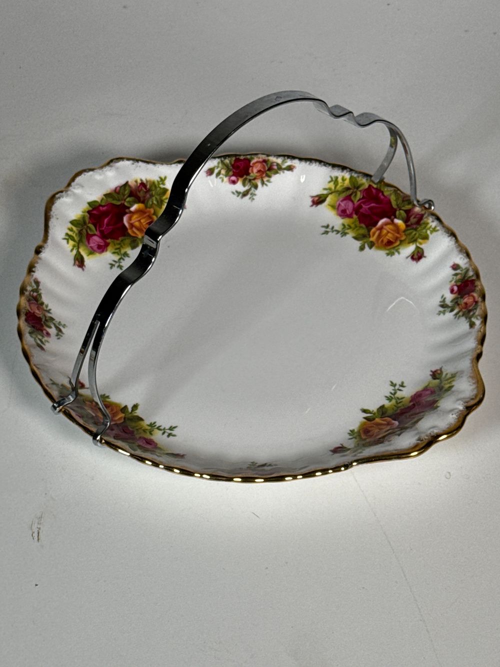 Lot 251: A Royal Albert Old Country Roses handled bone china cake plate