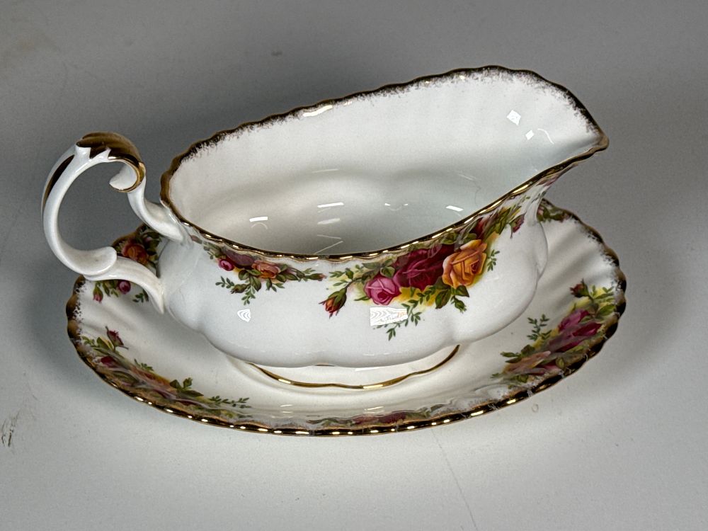 Lot 252: Royal Albert Old Country Roses bone china gravy boat and underplate