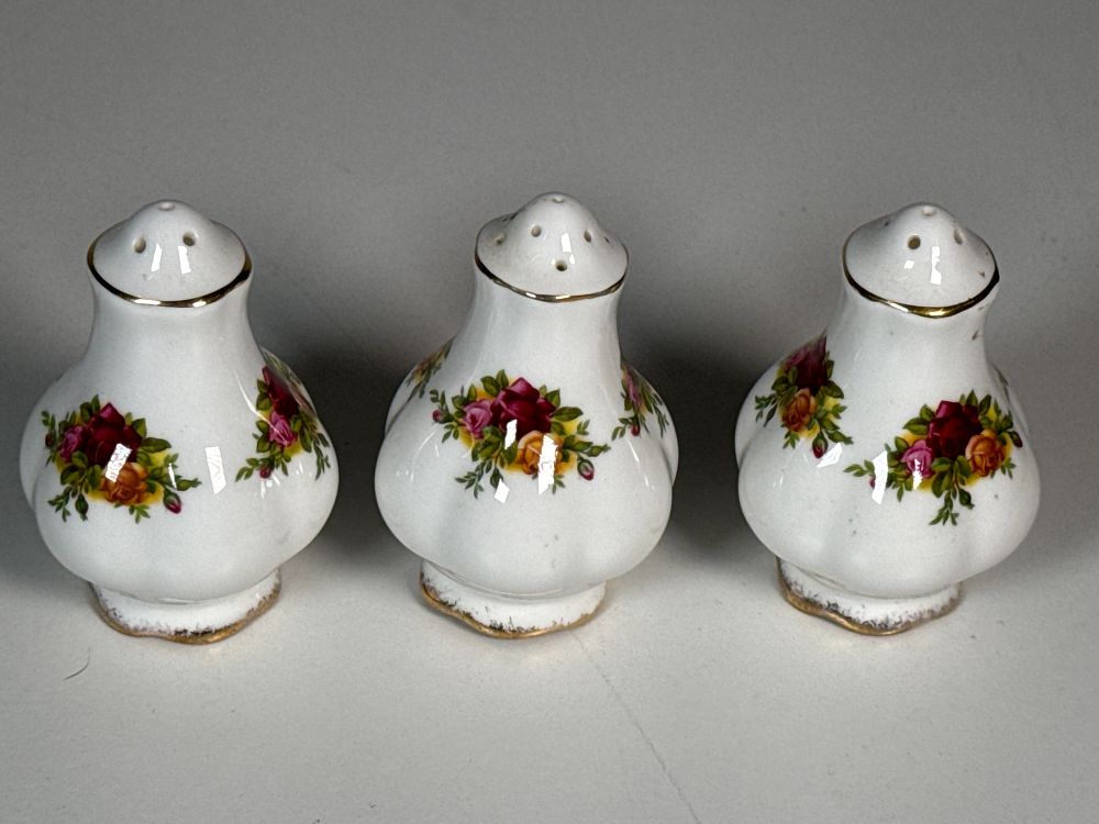 Lot 255: A Trio of Porcelain Shakers in the Old Country Roses Pattern