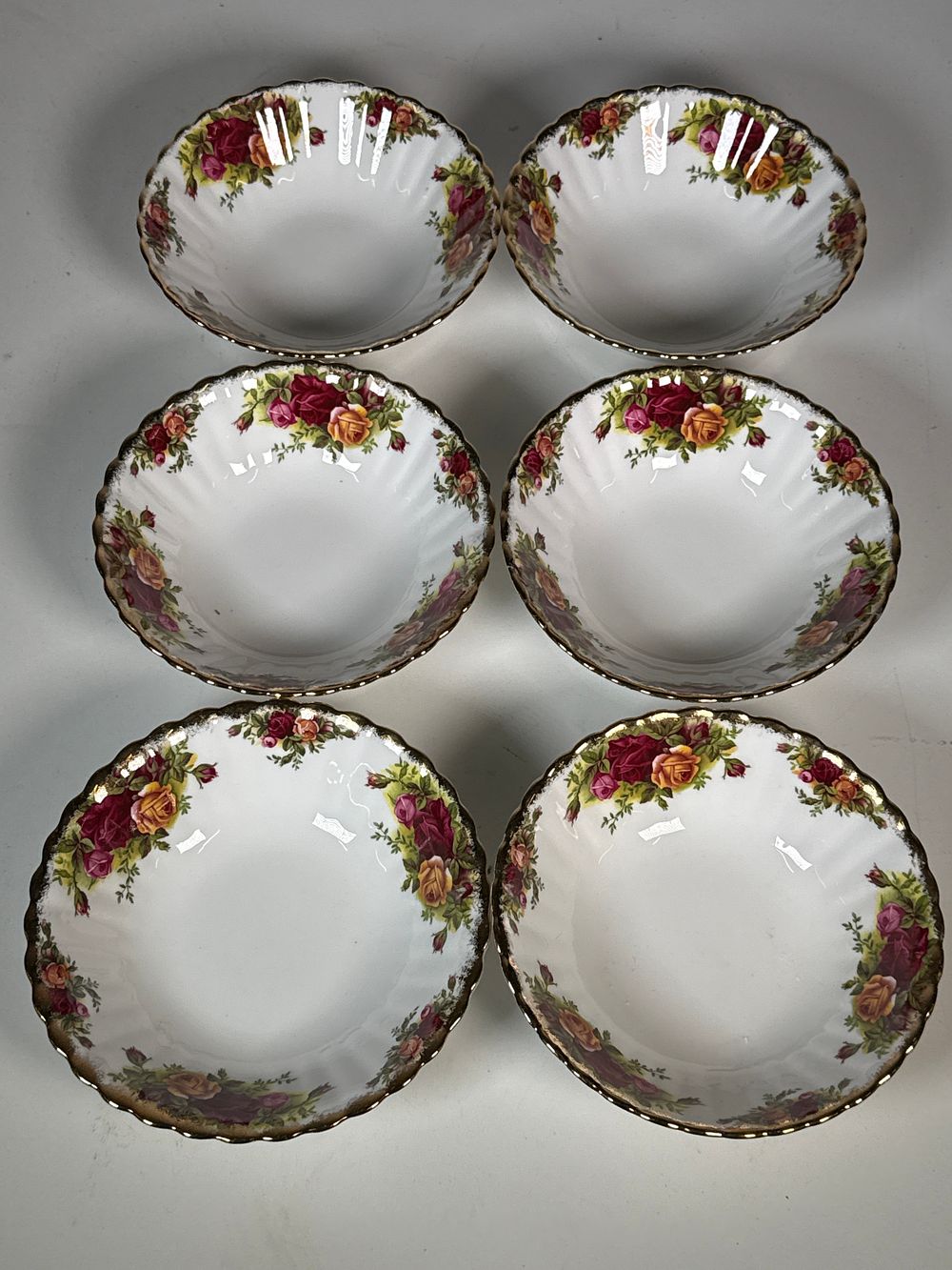 Lot 257: A set of six floral patterned bone china bowls