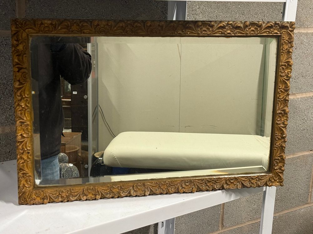 Lot 261: A Small ( 24”wide) rectangular beveled wall mirror in a gilt frame