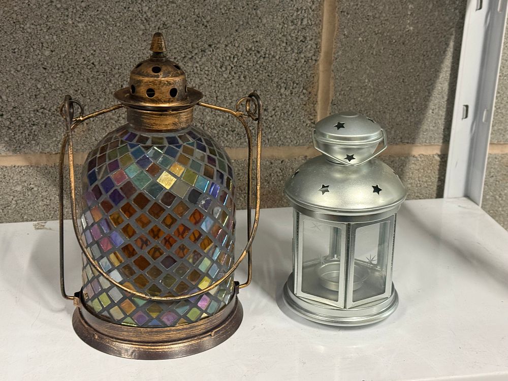 Lot 262: Two decorative metal and glass candle lanterns
