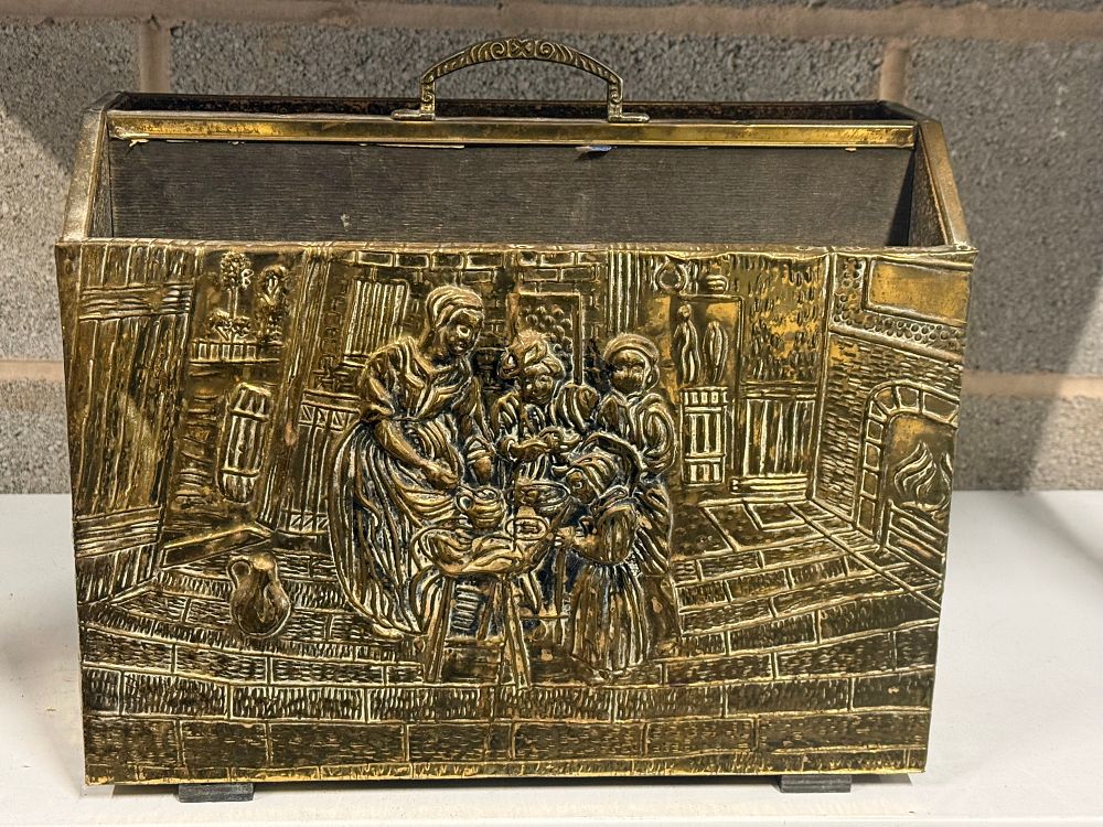 Lot 264: A Dutch style embossed brass clad wooden magazine rack