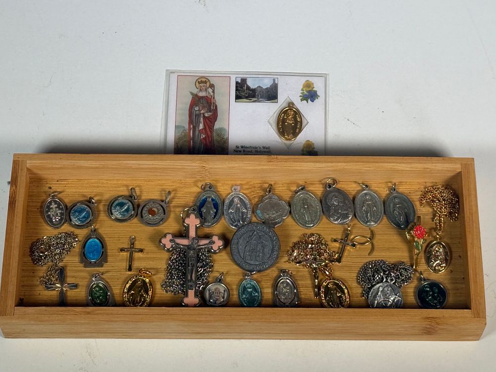 Lot 266: A Collection of Religious Medals and Devotional Pendants