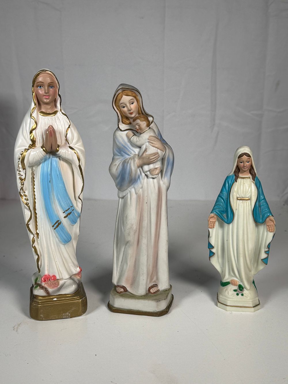 Lot 274: A Trio of Painted Ceramic Devotional Figurines of the Virgin Mary