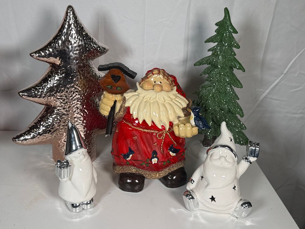 Lot 275: A collection of decorative ceramic Christmas trees and figurines