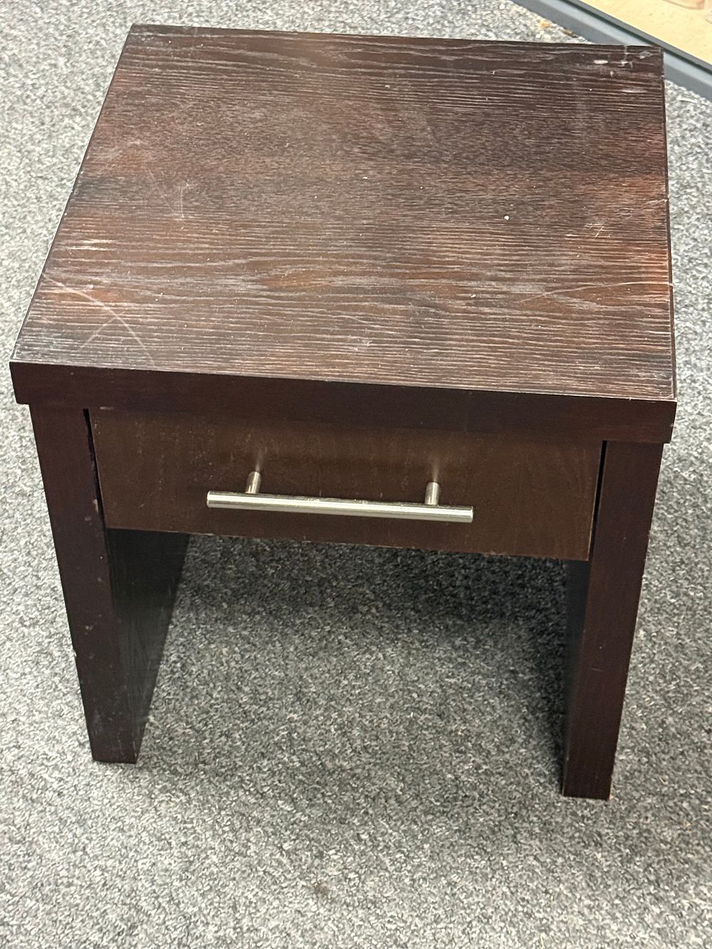 Lot 288: A dark wood veneer single drawer side table