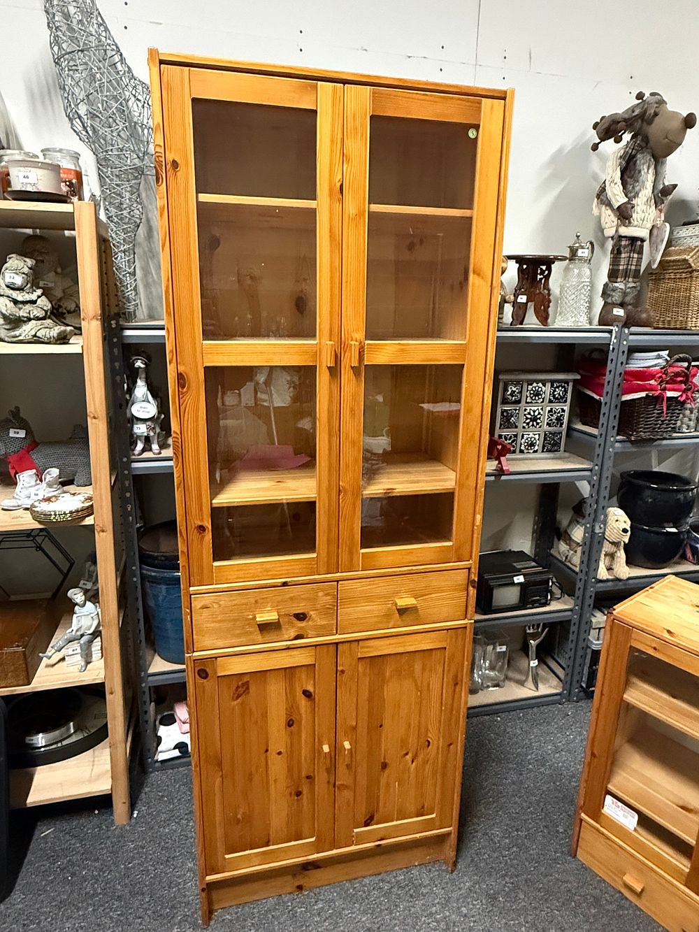 Lot 302: A pine two-piece display cabinet and cupboard