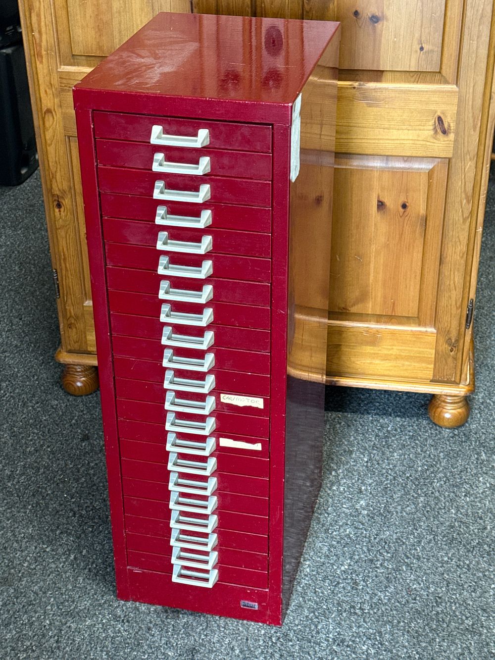 Lot 307: A Stor brand red metal twenty one drawer storage cabinet