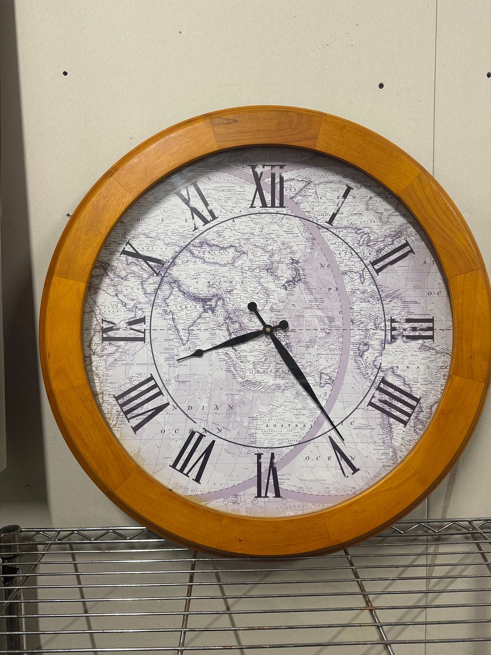 Lot 1: Large vintage style wooden wall clock with world map dial over 24 inch Diameter