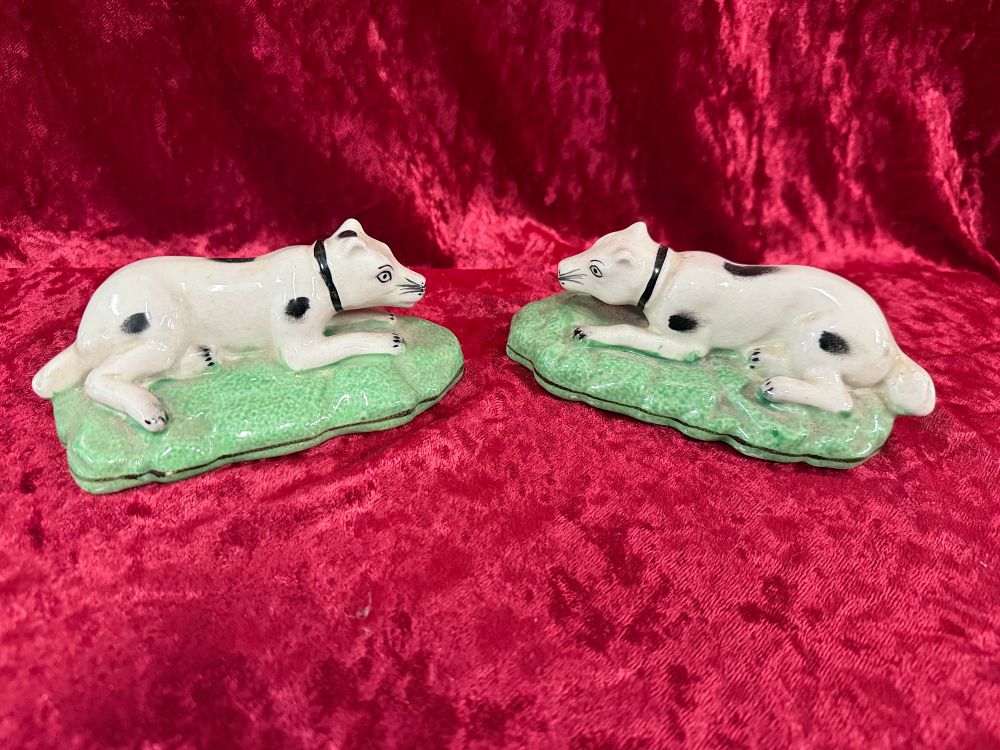 Lot 23: A Pair of Recumbent Staffordshire Style Ceramic Hound Figurines