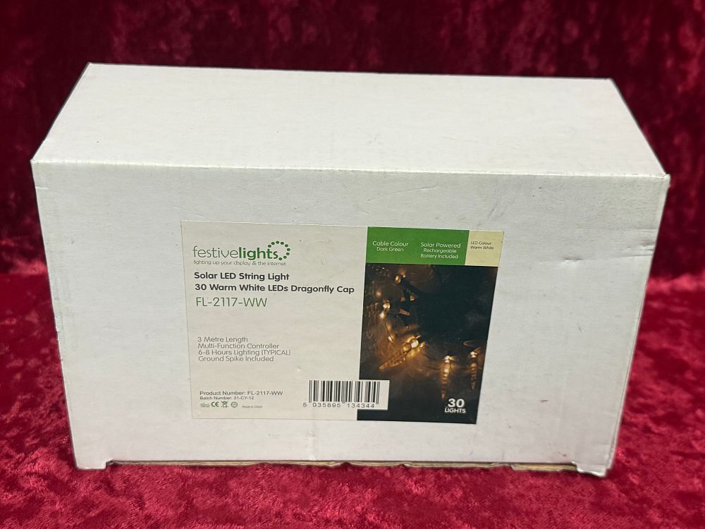 Lot 13: A boxed set of Festive Lights solar dragonfly string lights