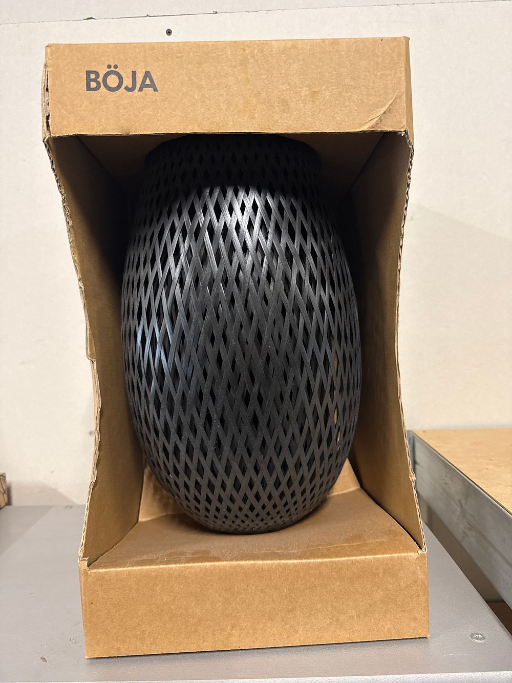 Lot 30: IKEA Boja black woven bamboo table lamp by Maria Vinka