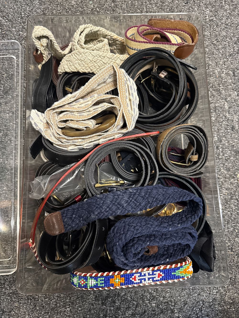Lot 33: An assortment of leather and woven fashion belts