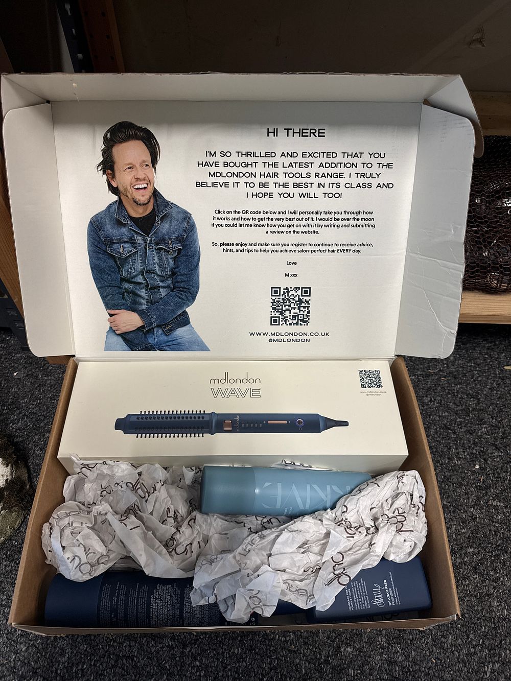 Lot 40: A mdlondon WAVE styling brush and Arkive hair products set